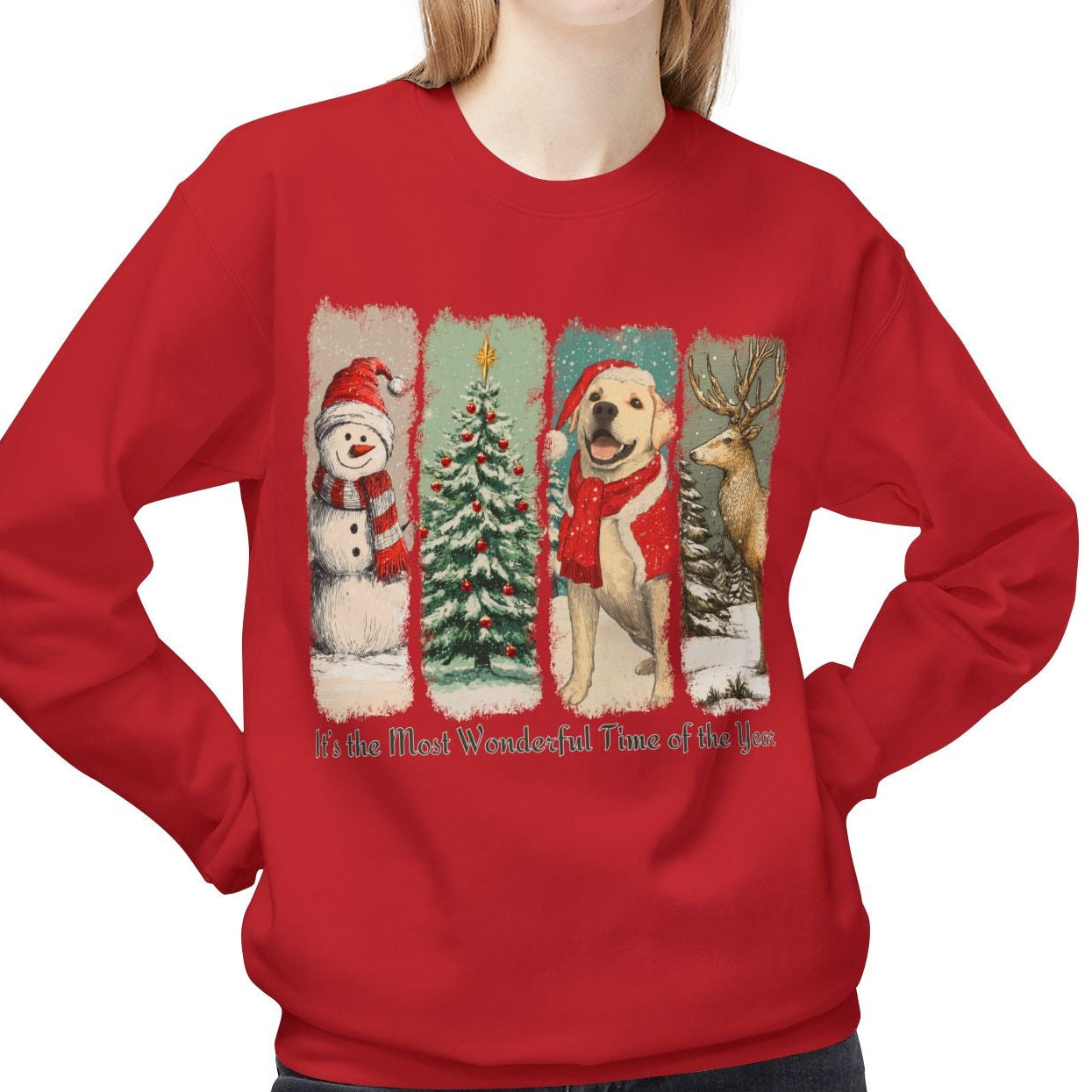 Person wearing a red Christmas-themed sweatshirt with a snowman, dog, and tree design.