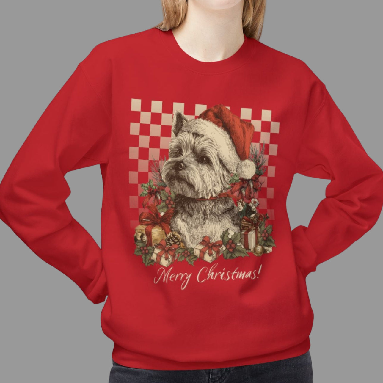 Person wearing a red Christmas-themed sweatshirt with a dog design on a white background