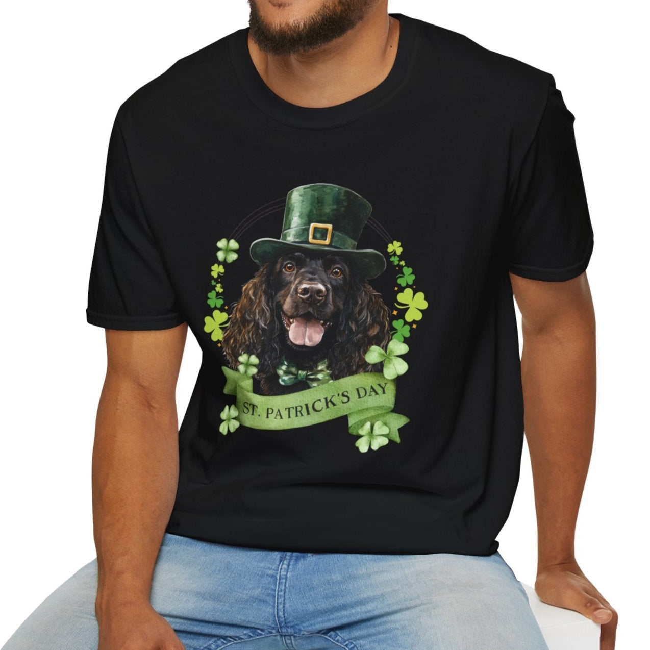 St. Patrick’s Day black t-shirt featuring an Irish Water Spaniel with a shamrock garland and festive Irish design