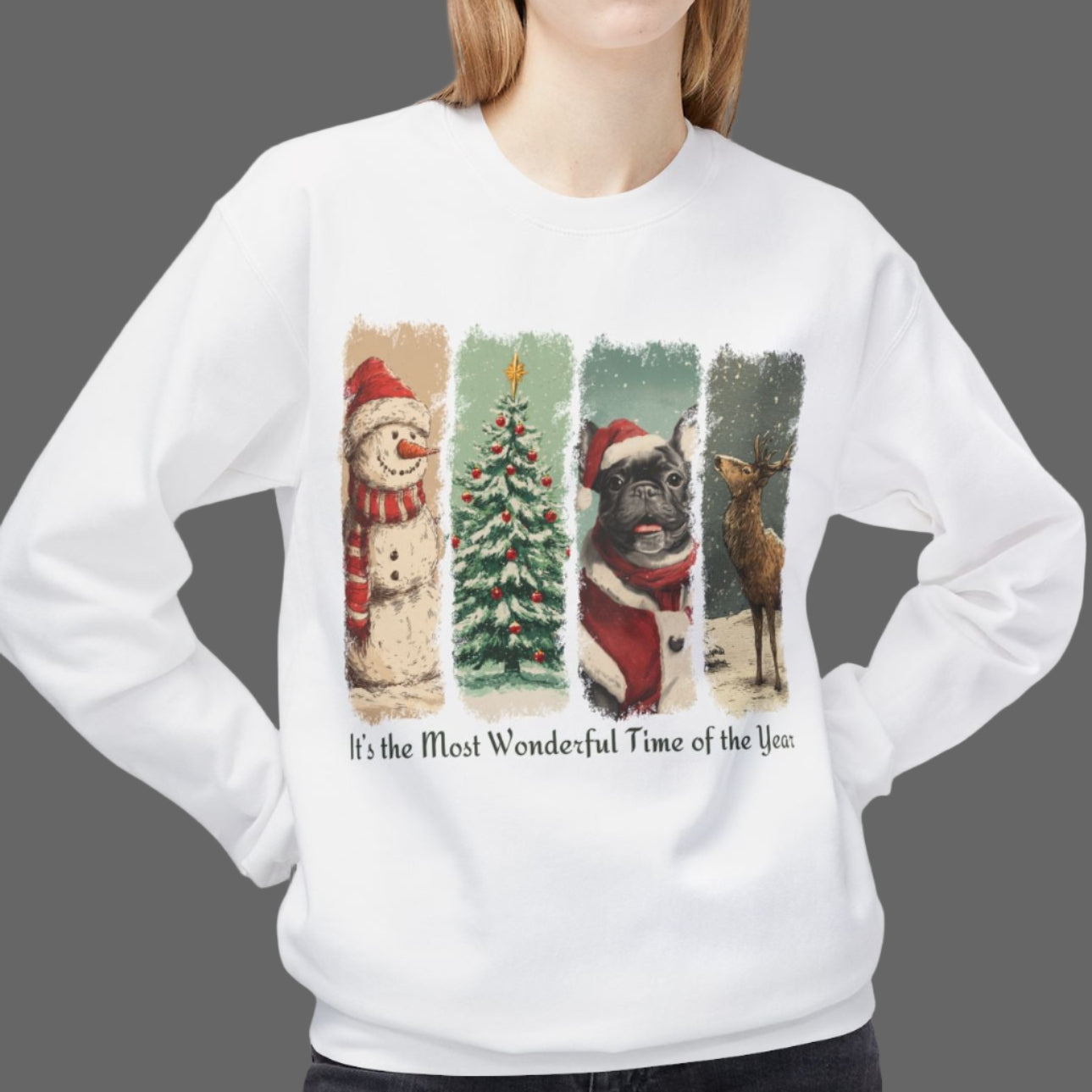 Person wearing a white sweatshirt with Christmas-themed design on a white background