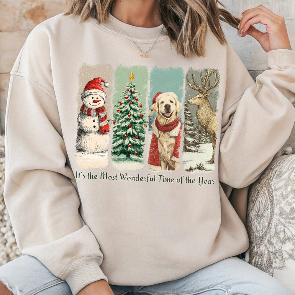 Beige sweatshirt with Christmas-themed design featuring a snowman, tree, dog, and deer.