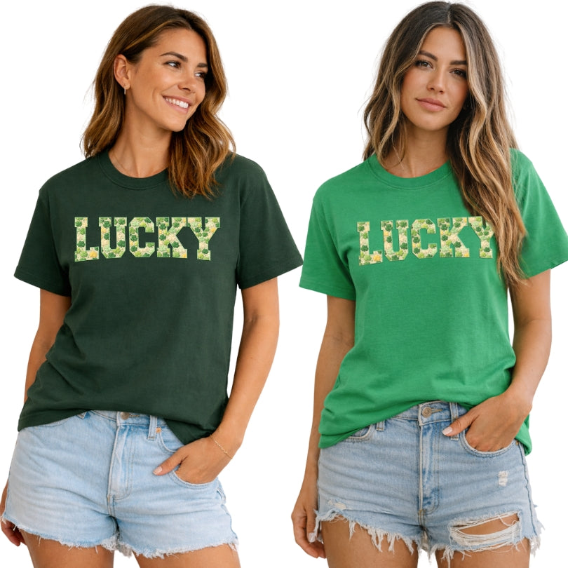 Two women wearing green t-shirts with 'LUCKY' print, standing side by side.