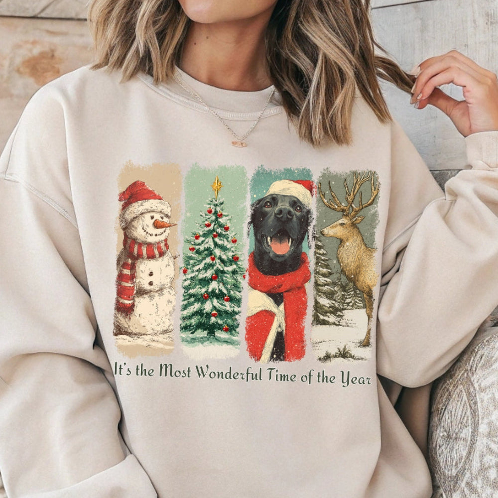 Person wearing a beige sweatshirt with Christmas-themed graphics and text.
