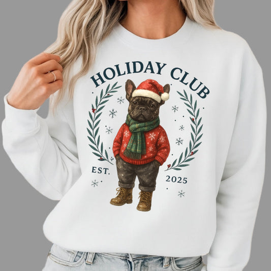 White sweatshirt with a festive design of a dog in a Santa hat and sweater, labeled 'Holiday Club'.