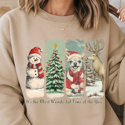 Person wearing a beige sweatshirt with Christmas-themed graphics and text.