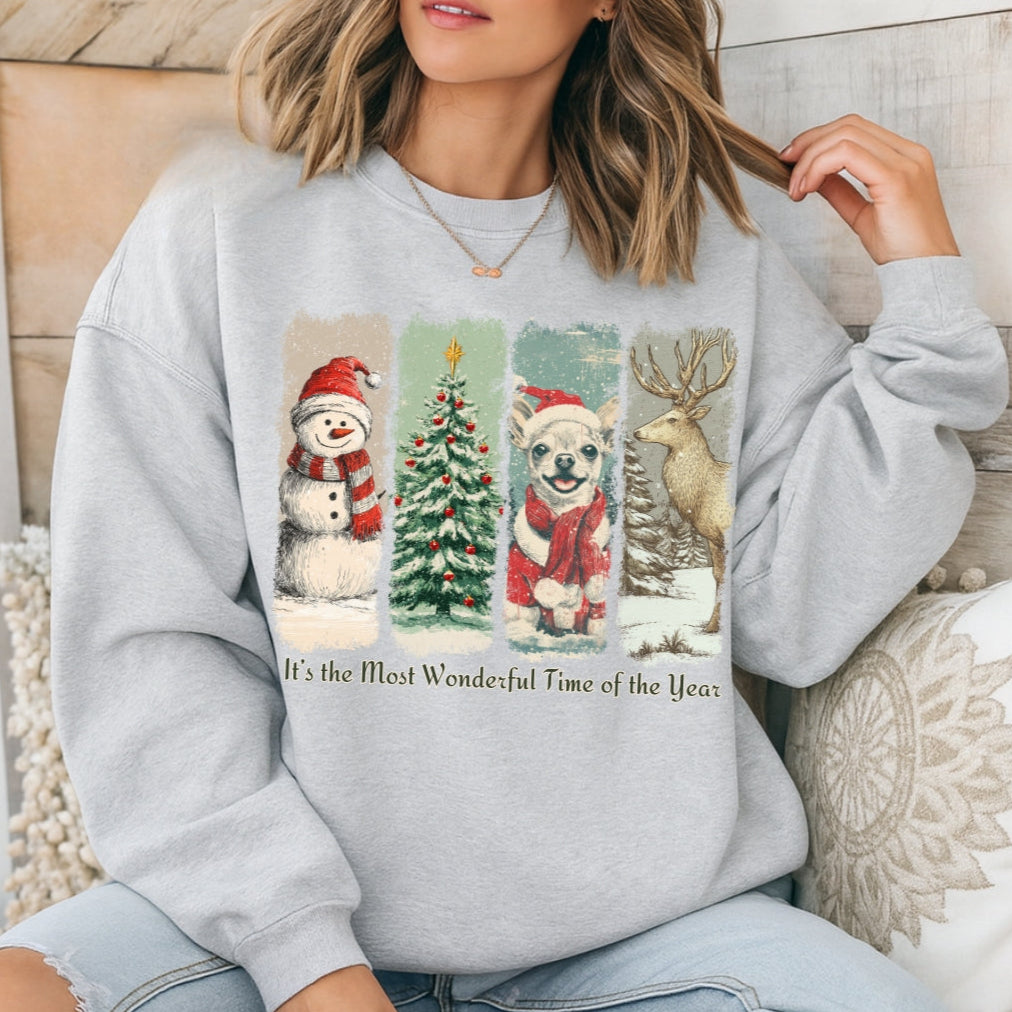 Person wearing a gray sweatshirt with Christmas-themed designs and text.