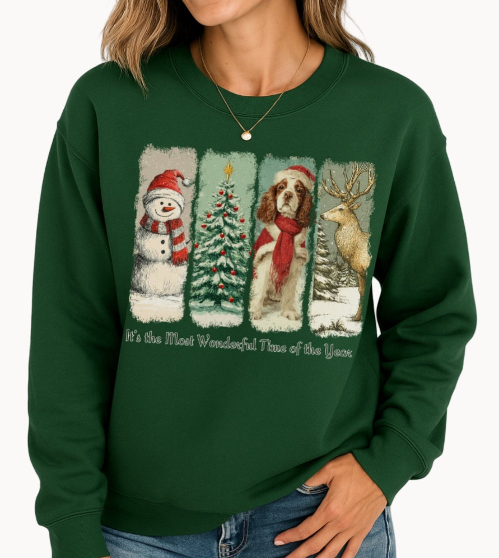 Person wearing a green Christmas-themed sweatshirt with festive illustrations.