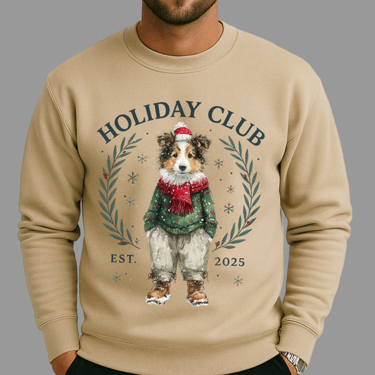 Beige sweatshirt with a dog illustration and 'Holiday Club' text on a plain background