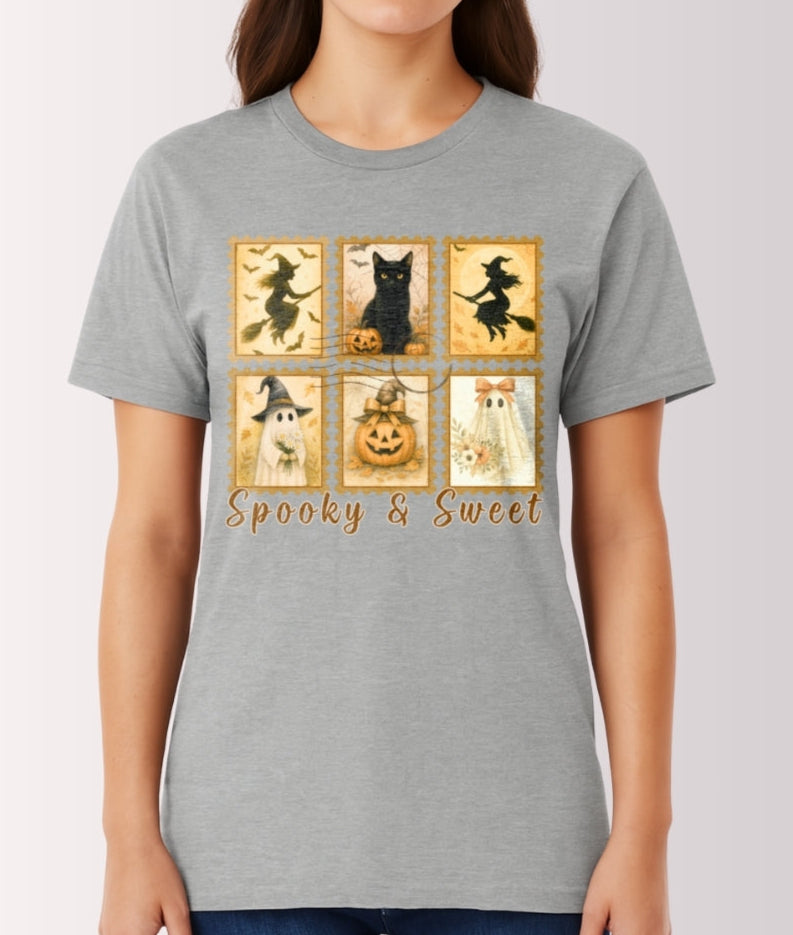 Person wearing a gray t-shirt with Halloween-themed design and text.