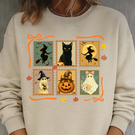 Beige sweatshirt with Halloween-themed graphics on a gray background