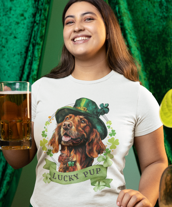 A woman wearing white St. Patrick’s Day t-shirt featuring an irish setter dog with a shamrock garland and festive Irish design