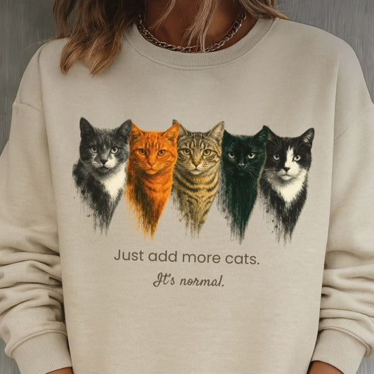 sand cat lover sweatshirt with cat illustrations and text on a gray background
