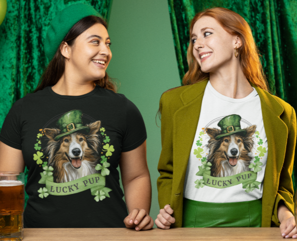 two dog lovers in St. Patrick’s Day t-shirts featuring a Sheltie dog with a shamrock garland and festive Irish design
