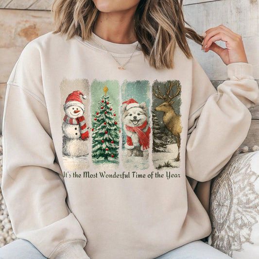 Person wearing a beige sweatshirt with Christmas-themed graphics and text.