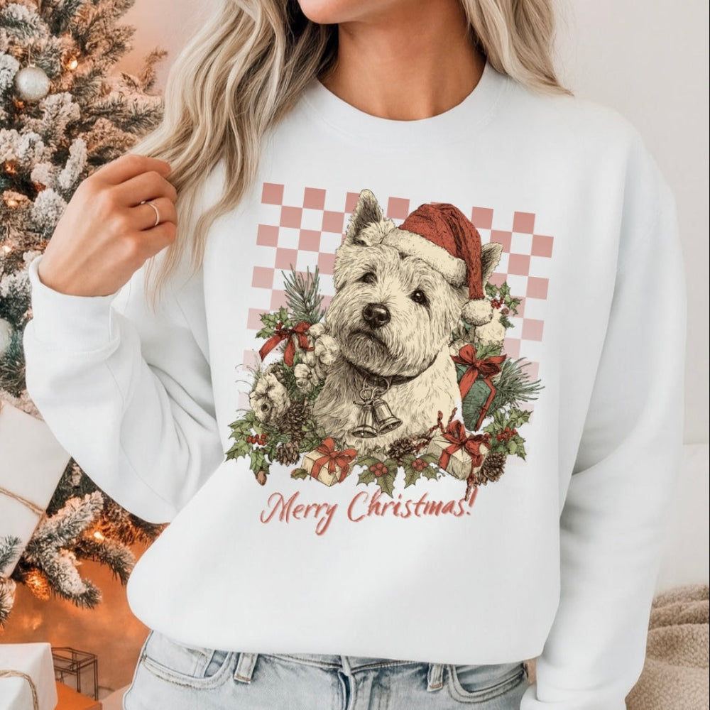 Person wearing a white sweatshirt with a Christmas-themed dog design in a festive setting.