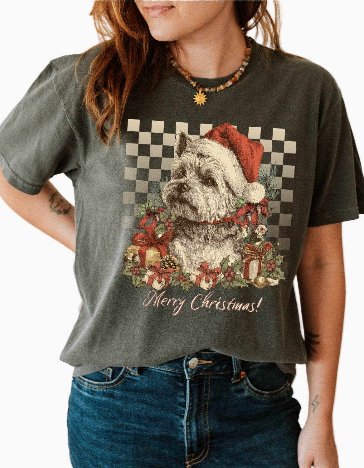 Person wearing a Christmas-themed t-shirt with a dog graphic and 'Merry Christmas!' text.
